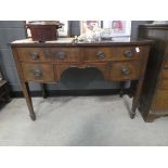 Bow fronted Edwardian four drawer desk