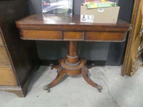 A Regency/William IV rosewood card table, the folding surface with a baize lining over a frieze with