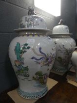 Pair of large Chinese lidded vases with floral pattern (af)