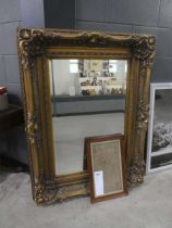 Rectangular bevelled mirror in decorative gilt frame