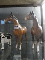 Two Beswick and Beswick style horses