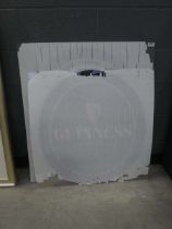 Two perspex Guinness advertising signs