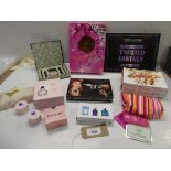 +VAT Selection of cosmetic and toiletry gift sets including Revolution, e.l.f, Clarins, JImmy