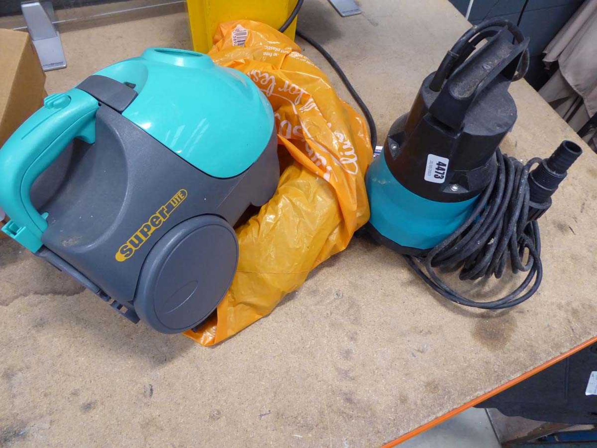 Submersible pump and a small vacuum cleaner