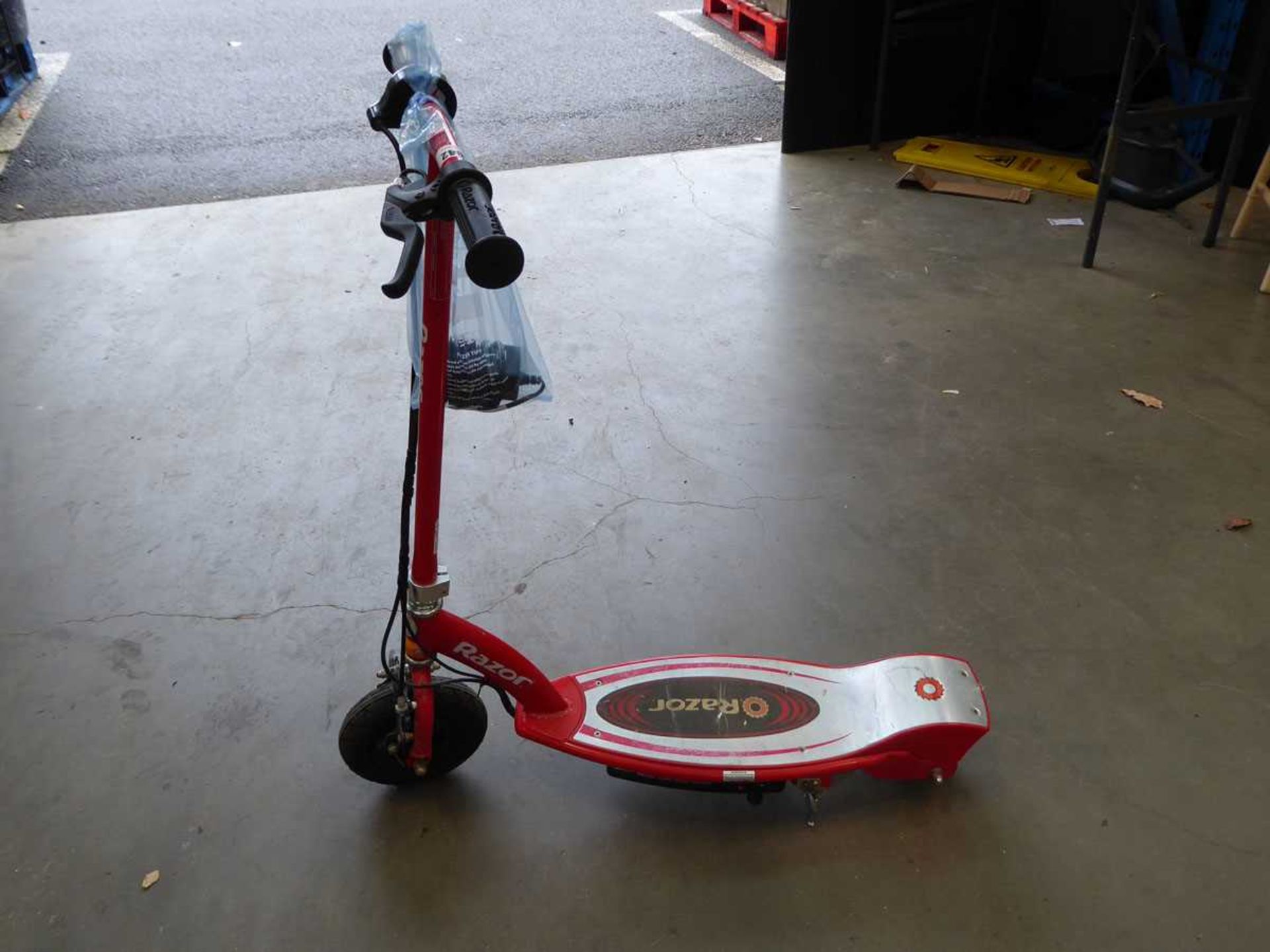Razor electric scooter, with charger in bag