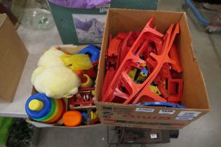 2 boxes containing Care Bear, plus Fisher Price toys, to include minibus, rings and stand,