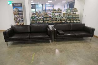 Pair of leather effect two seater sofas