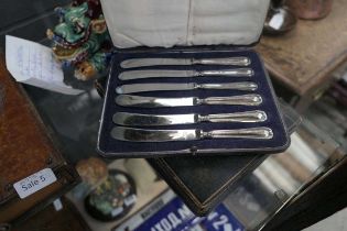 6 x silver tea spoons with sugar nips plus 2 x sets of butter knives with silver handles