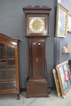 Mahogany long case clock with brass dial