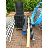 Pallet containing guttering, drainage pipe, and filter box