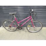 Small pink Apollo girls bike