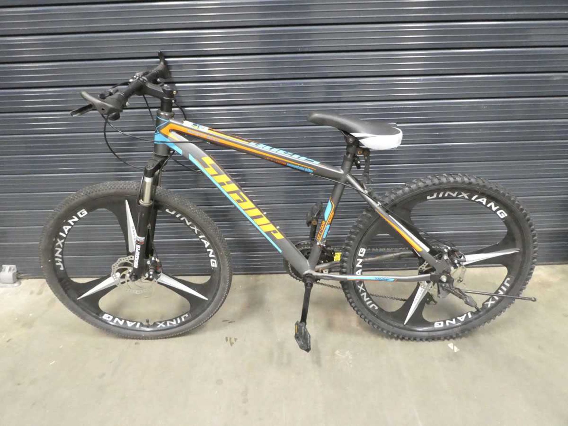 Shanp grey and orange child's mountain bike