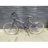 Purple Raleigh girls bike