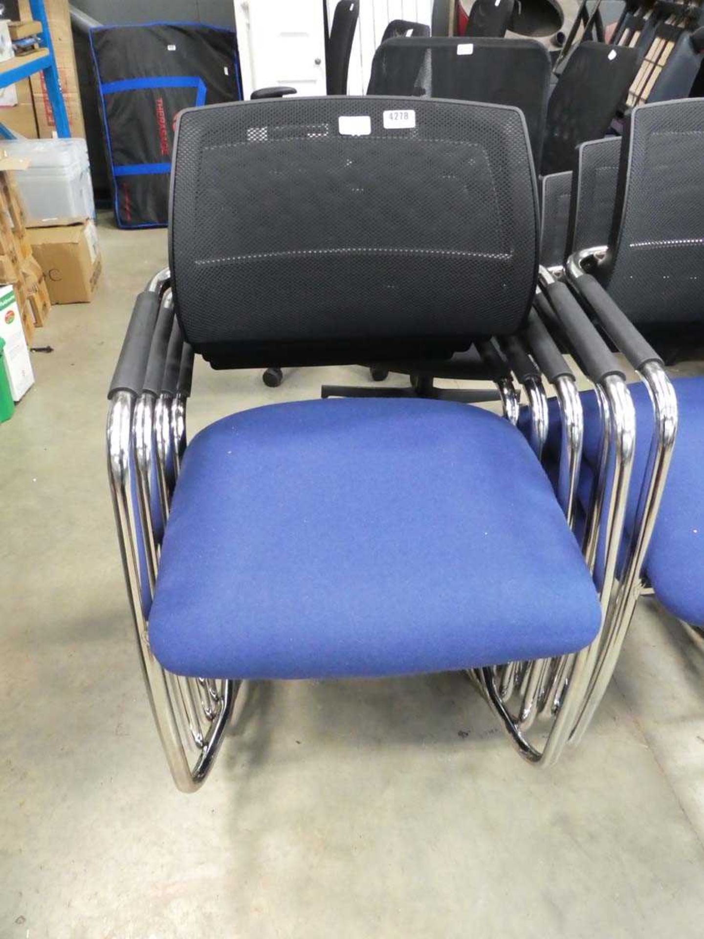 4 blue chrome framed slide frame stacking chairs