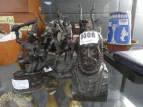 3 metal figures of Shakespeare, Eastern god and 4 cowboys