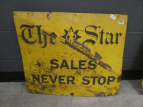 Enamel sign titled The star sales never stop