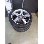 Two Jaguar alloy wheels and tyres