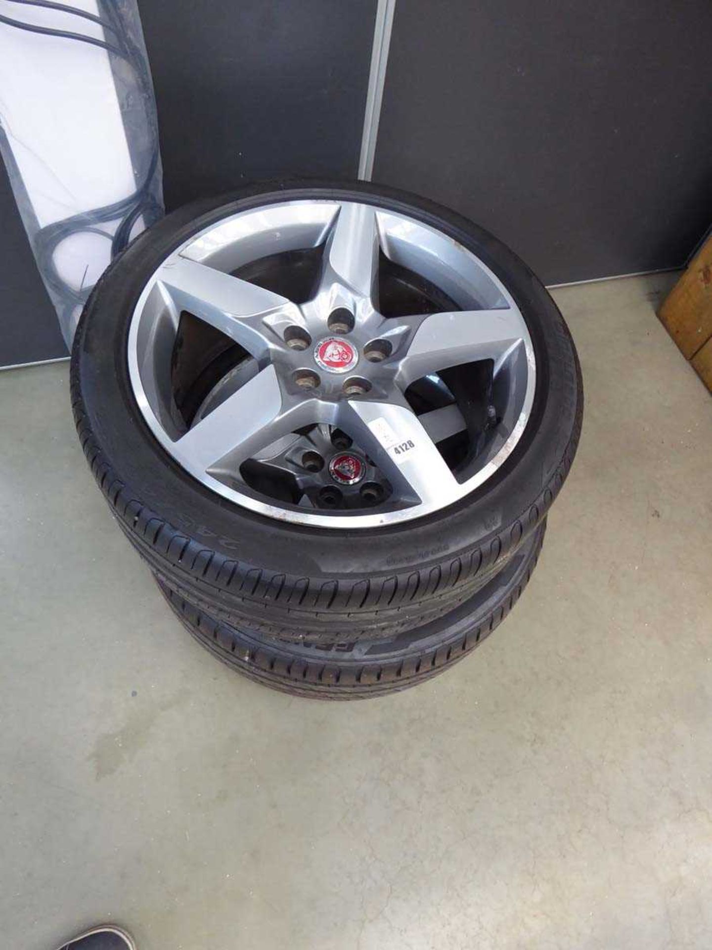 Two Jaguar alloy wheels and tyres