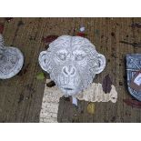 Concrete chimpanzee head statue