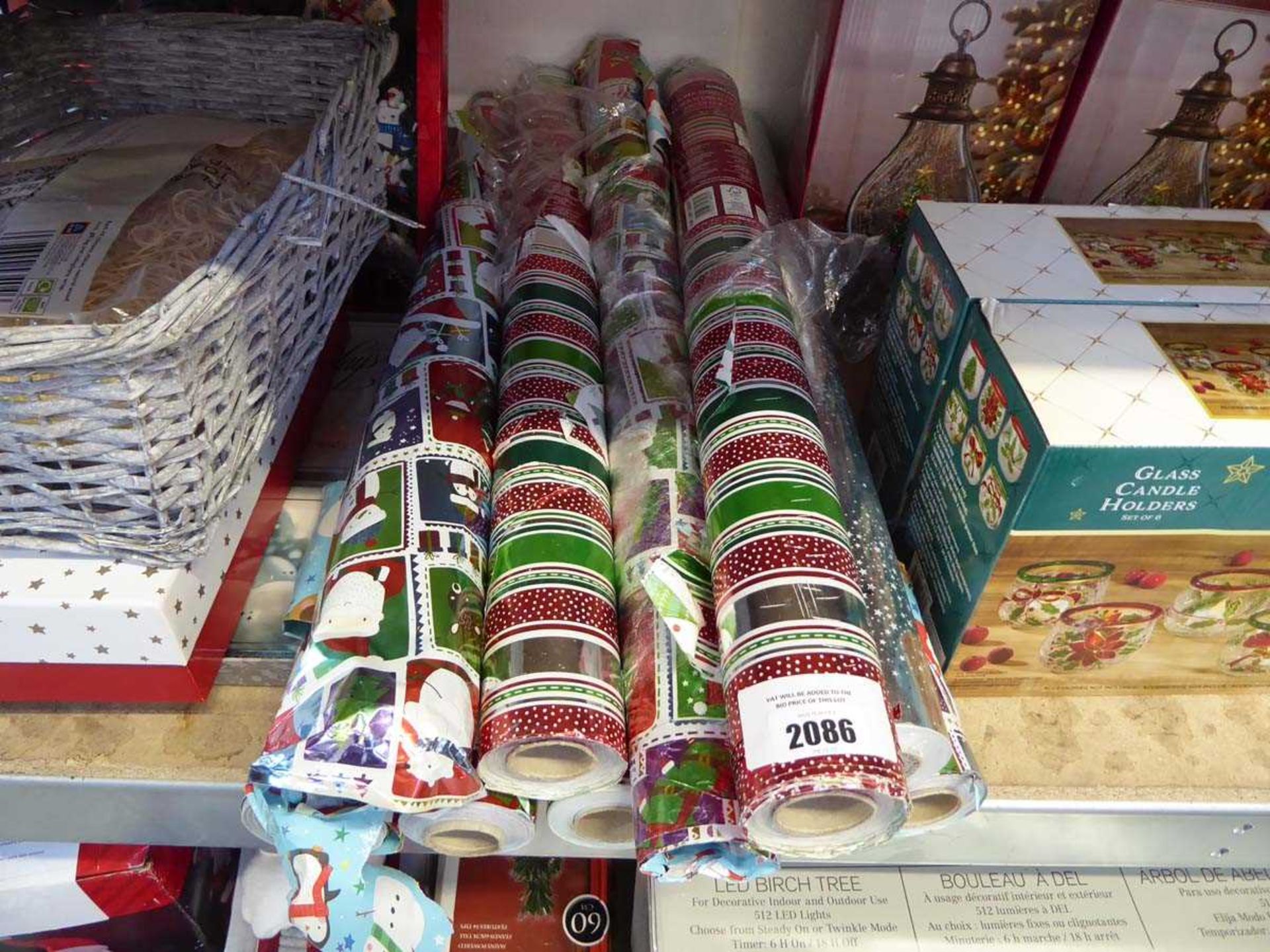 +VAT 10 rolls of new and used Christmas wrapping paper