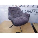 Grey cloth swivel armchair on 4 prong supports