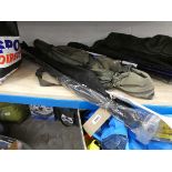 Dunlop fishing rod bag, together with a quantity of various fishing rods