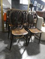 Set of 4 dark oak wheel backed dining chairs