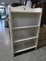 White painted free standing open fronted bookcase