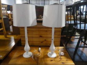 +VAT Pair of slender metal lanterns / lamps with white cylindrical shades