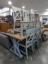 Modern grey dining table with oak plank effect surface and 6 matching panel seated dining chairs