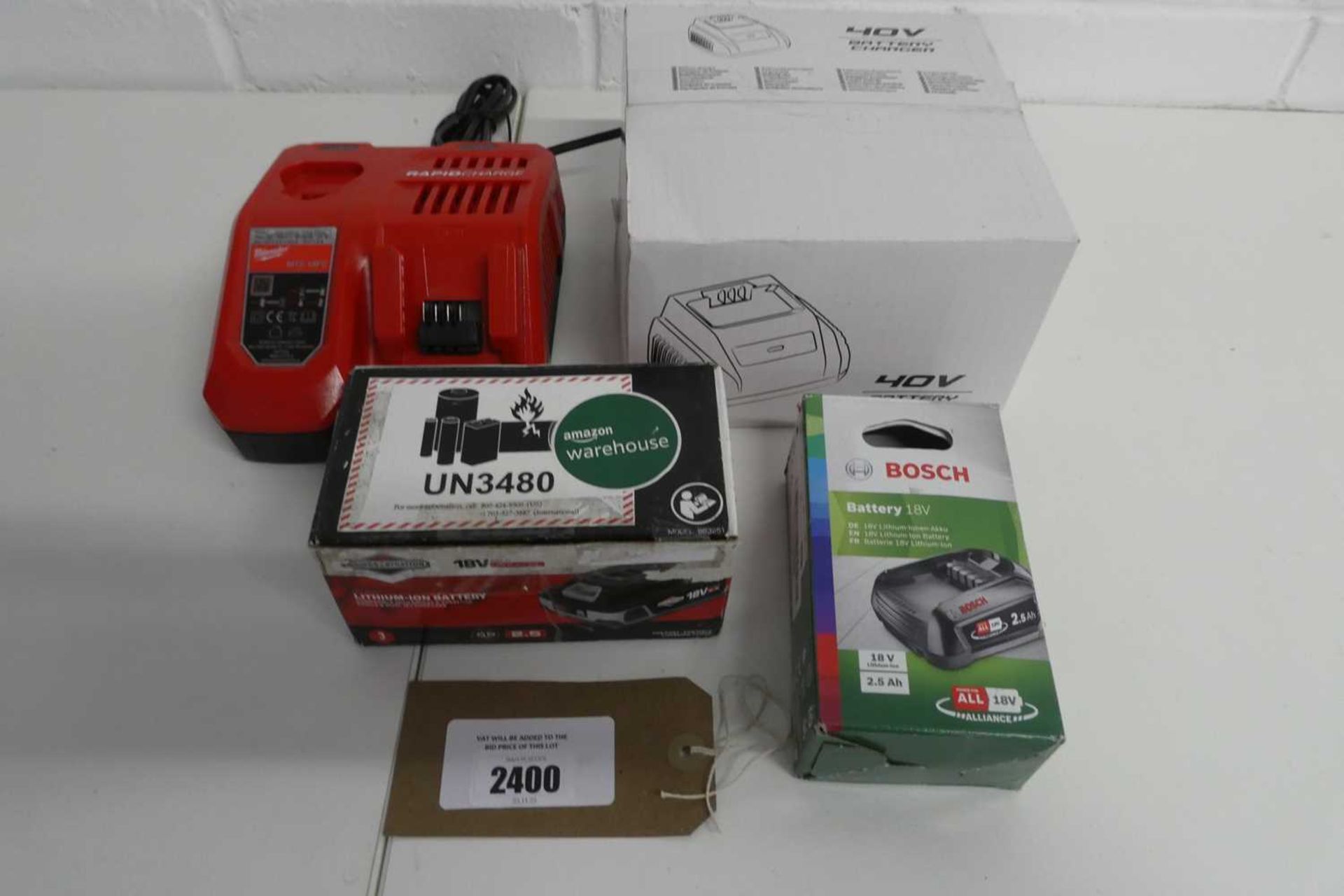 +VAT Milwaukee 18v battery charger together with a boxed 40v battery charger, Bosch 18v lithium