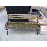Wooden slatted and metal ended garden bench