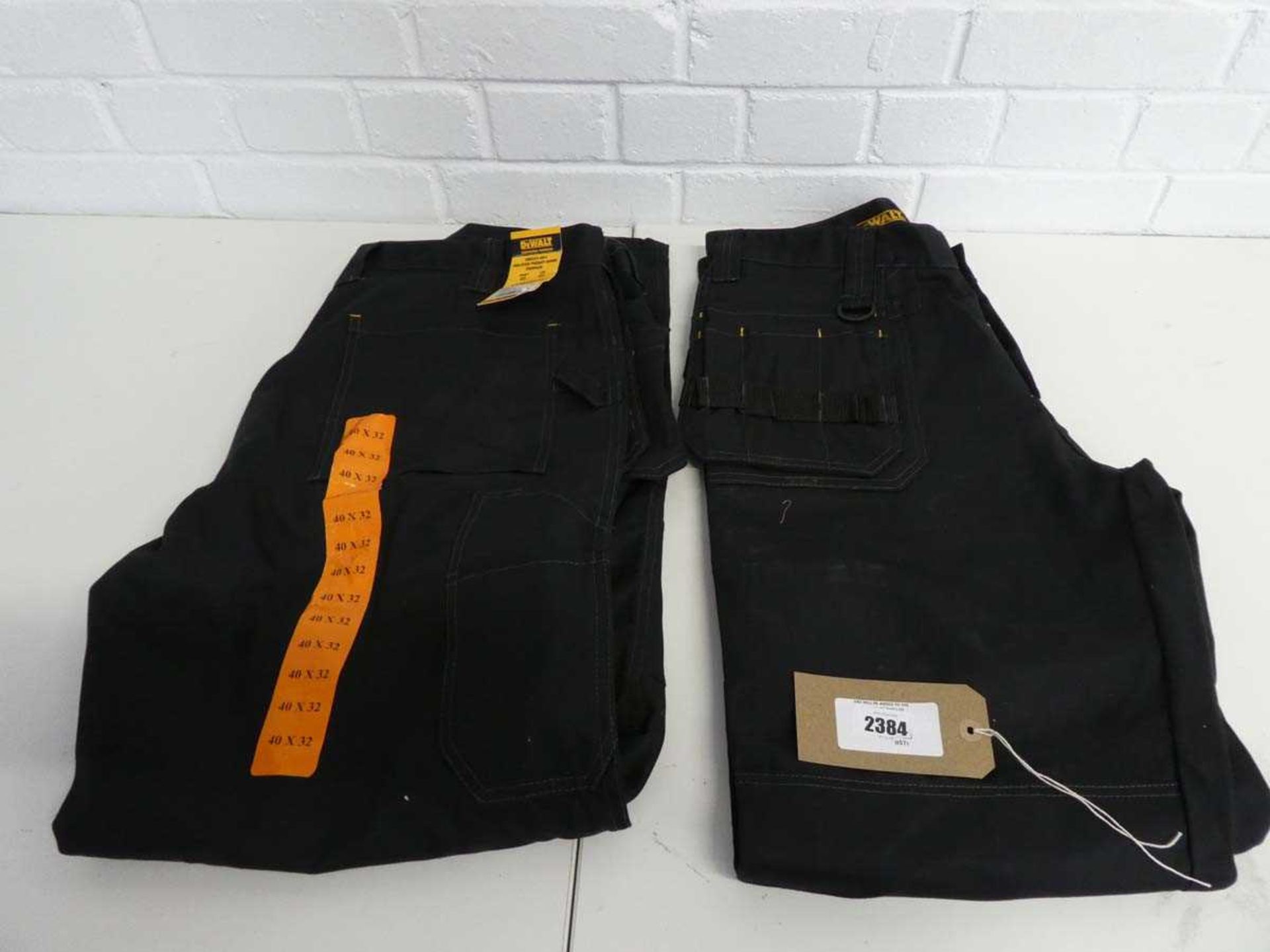 +VAT 2 pairs of DeWalt multi pocket work trousers, size 40 by 32 and 34 by 32