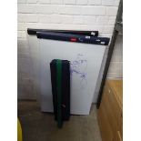 2 whiteboards together with a cased pop up flipchart