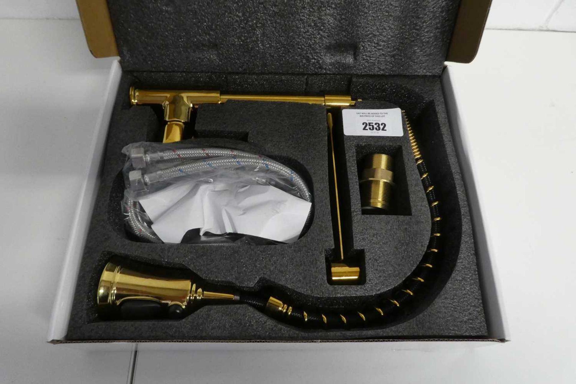 +VAT Boxed gold coloured single lever kitchen tap with extendable end