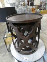 +VAT Pair of wooden drum shaped coffee tables with fretwork pattern