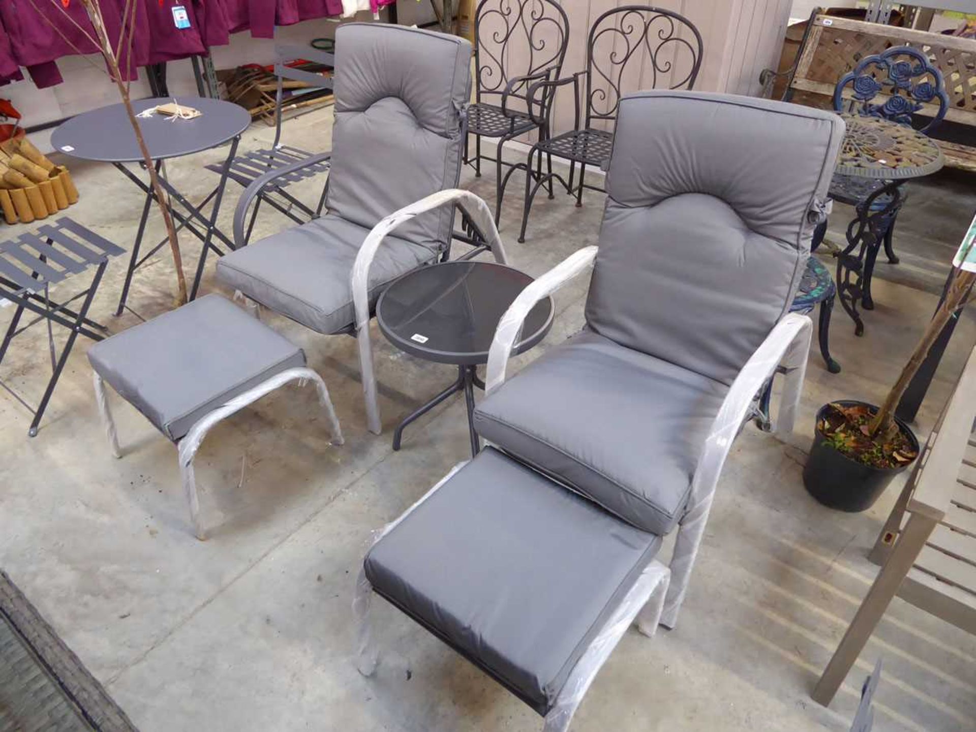 Grey aluminium framed 3 piece garden seating set comprising 2 armchairs and footstools (each with