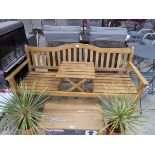 Wooden slatted 3 seater garden bench with lift top table insert