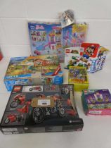 +VAT Mega Bloks Barbie house, Playmobil Family Fun treehouse set, Lego Super Mario starter course (