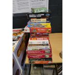 2 stacks of various puzzles and board games incl. The Game of Life, Snakes & Ladders drinking
