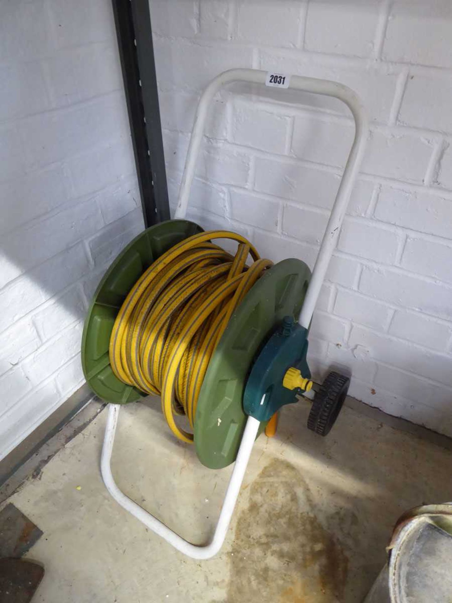 Garden hose reel on trolley