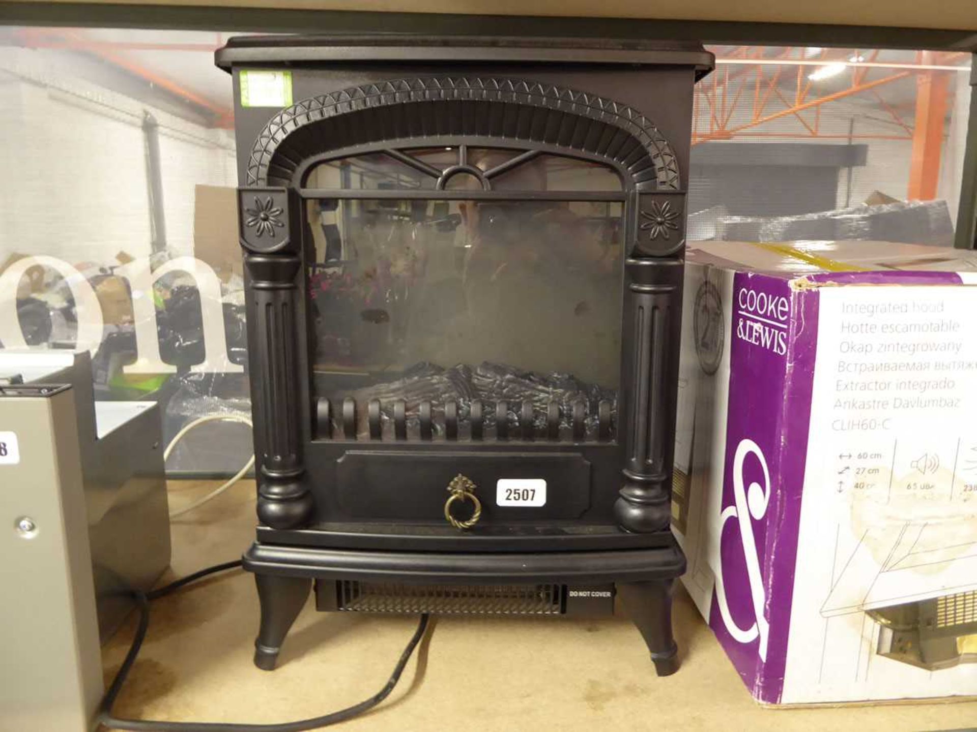 Unboxed warm light electric log effect stove