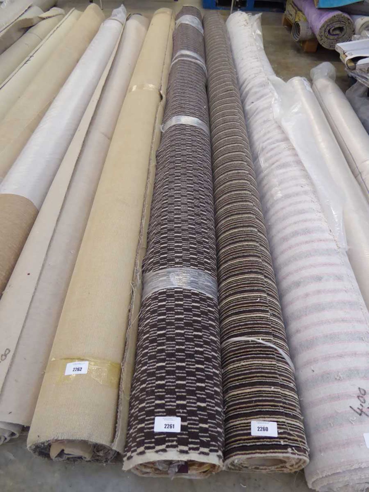 +VAT Large roll of brown and beige patterned carpet