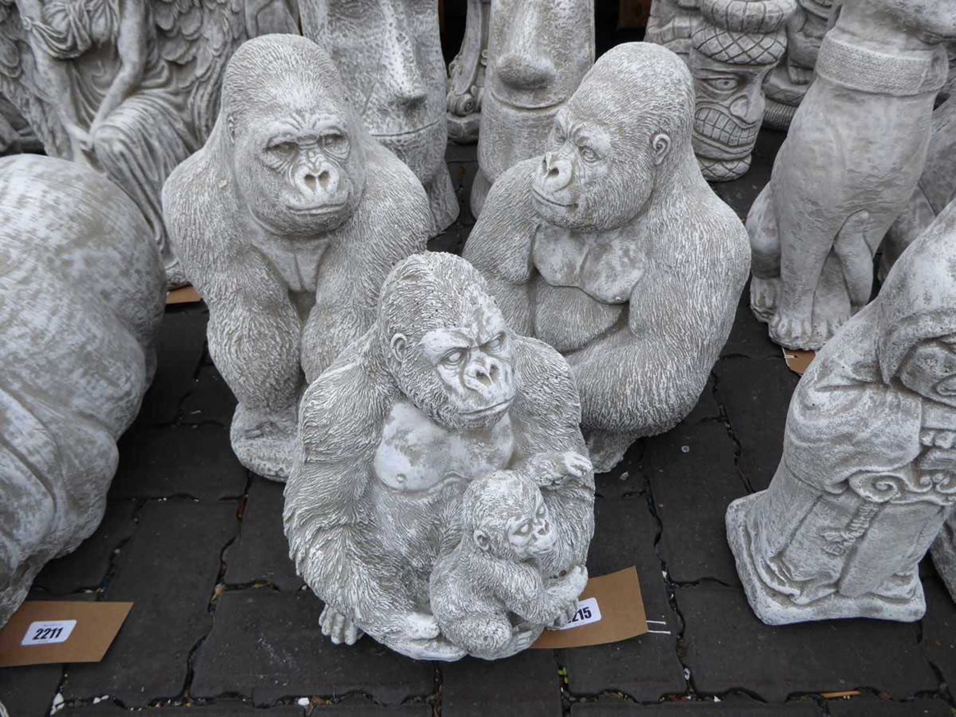 3 concrete ornaments of gorillas