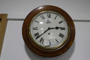 Dark oak cased circular wall clock