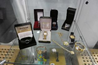 Shelf of watches incl. Citizen, Sekonda, Accurist, Past Times, etc.