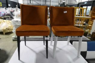 +VAT Modern pair of orange upholstered dining chairs on black tapered supports