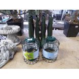 2 large bird feeders with 2 pairs of Wellington boots