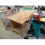Wooden framed work bench with integrated vice
