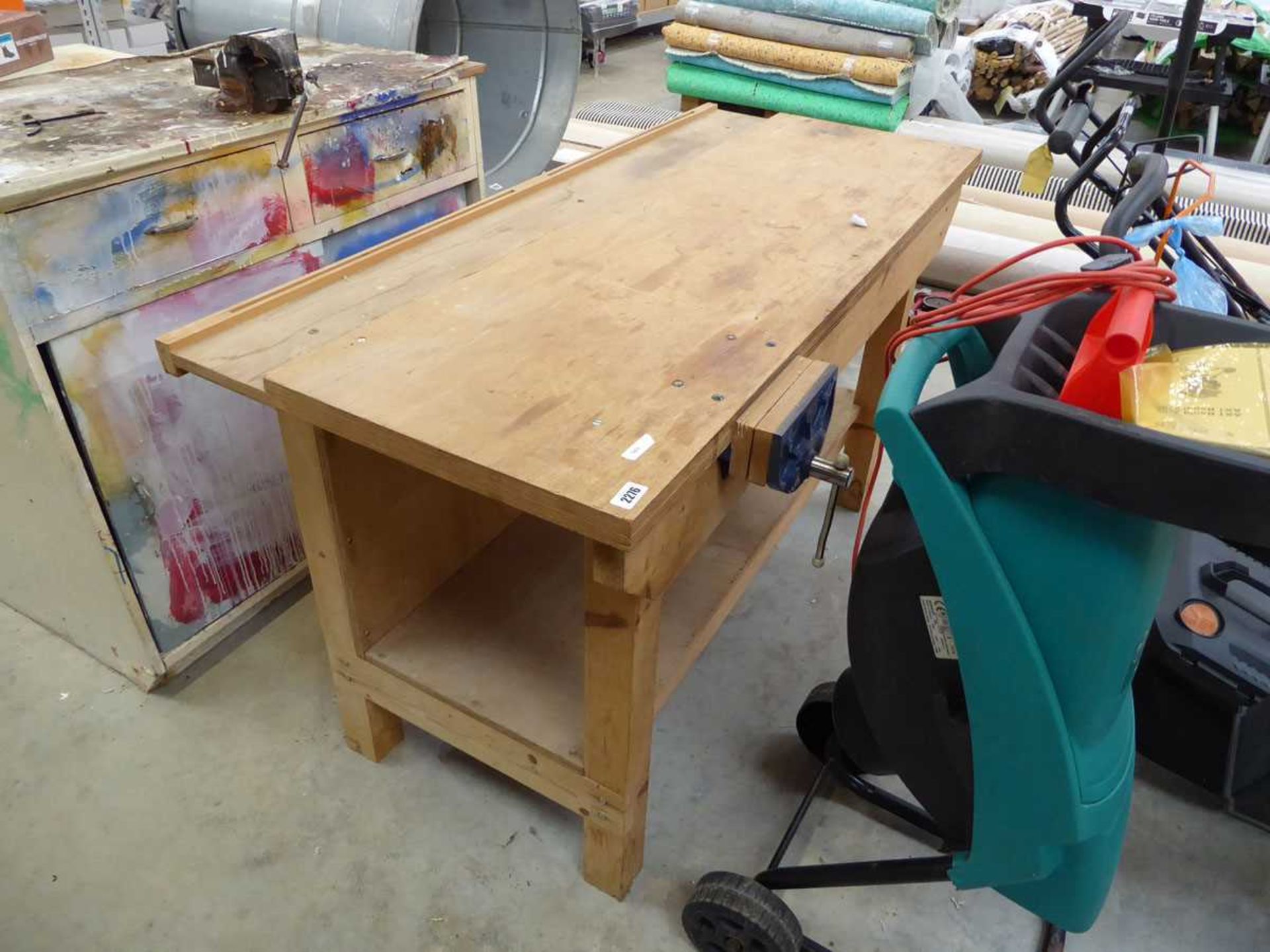 Wooden framed work bench with integrated vice